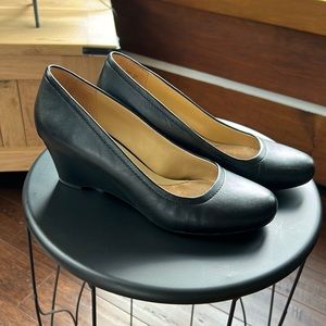Black leather wedge heels